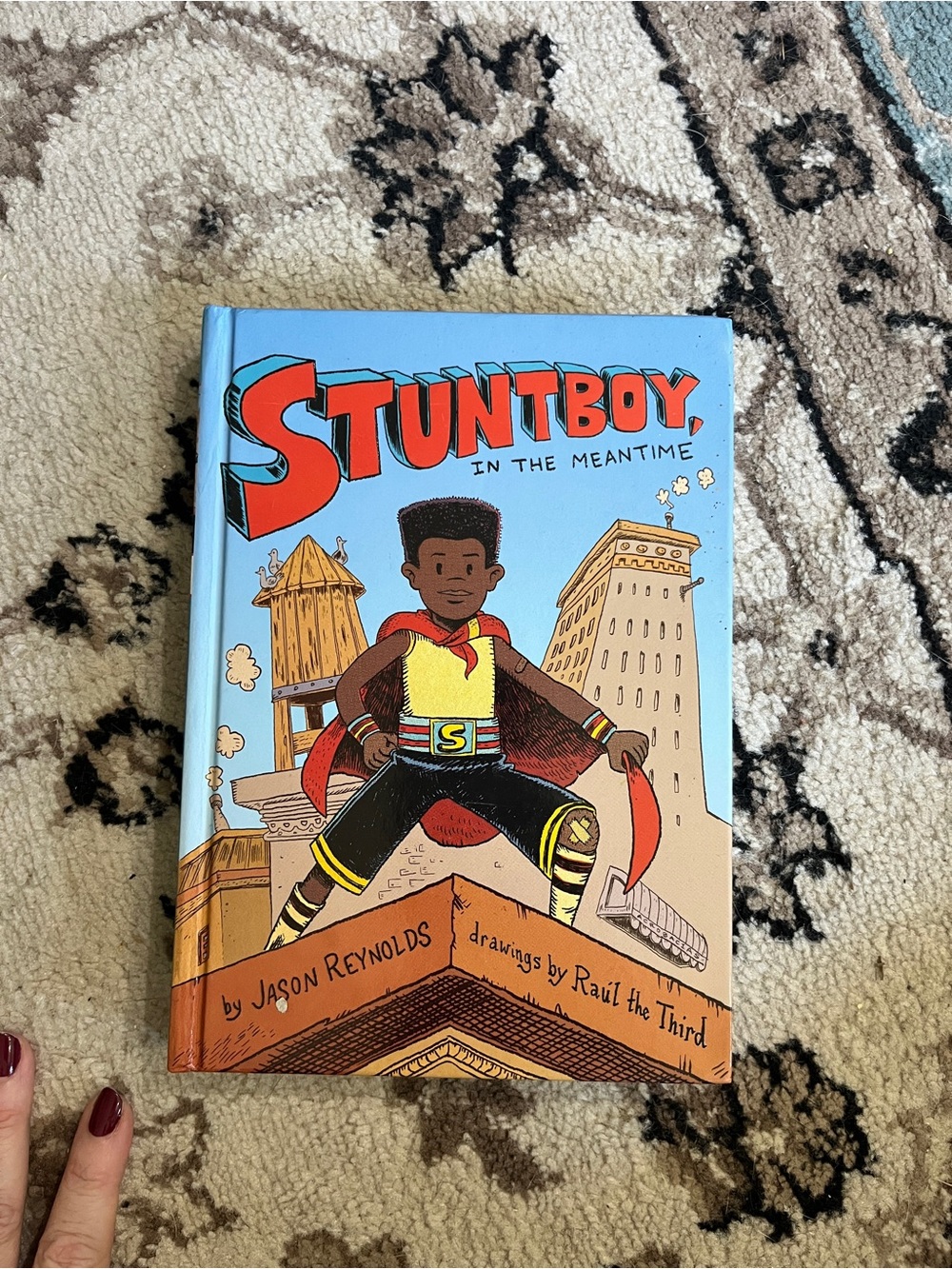 Stuntboy in the Meantime Hardcover Kids Book by - Light Blue & Orange